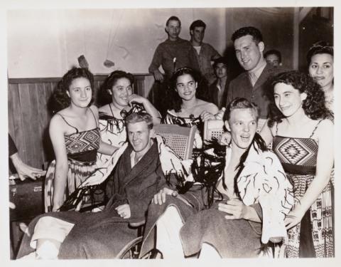 U.S. Marines convalescing after the Solomon Islands campaign and women from a Māori entertainment group at the U.S. Navy Base hospital on March 4, 1943