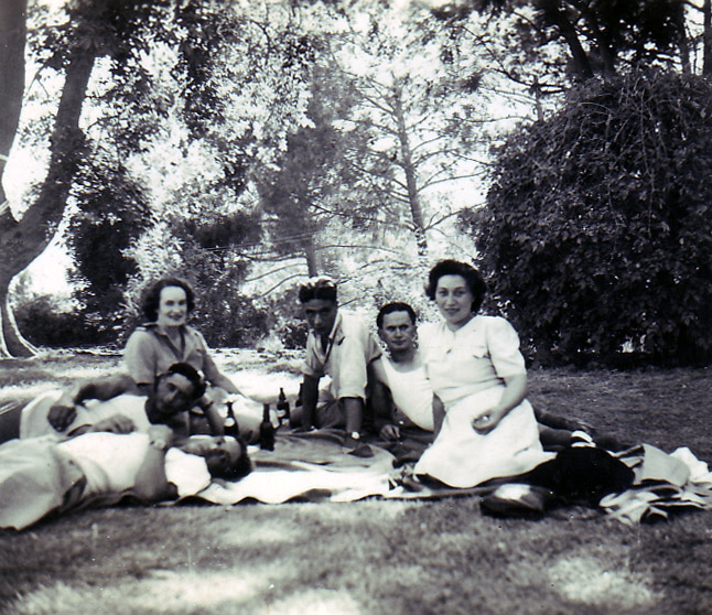 Ted  enjoying a picnic and a beer with his NZ Division mates..