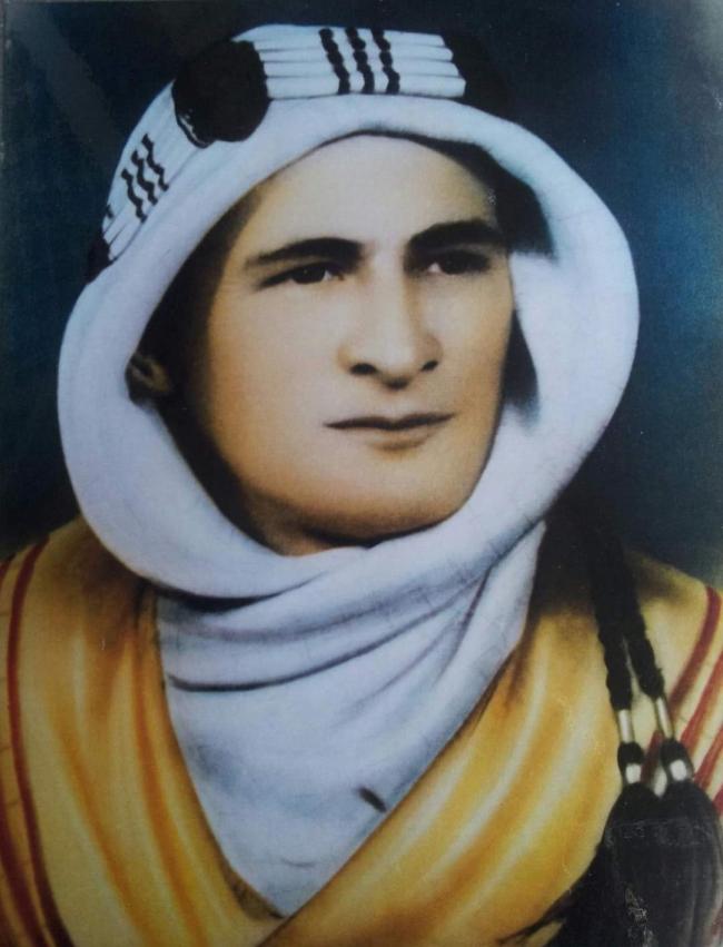 A man wearing a keffiyeh