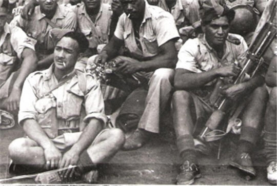 Ephraim Jack Prime in front with cigarette in mouth & friend Taniwha Sonny Waru with pipe in mouth