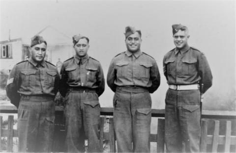 Four soliders in uniform. 