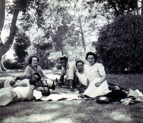 Ted  enjoying a picnic and a beer with his NZ Division mates..