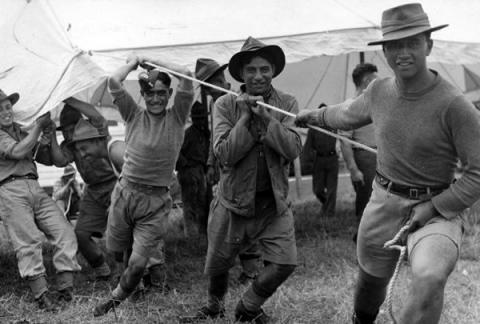Erecting a marquee at military camp