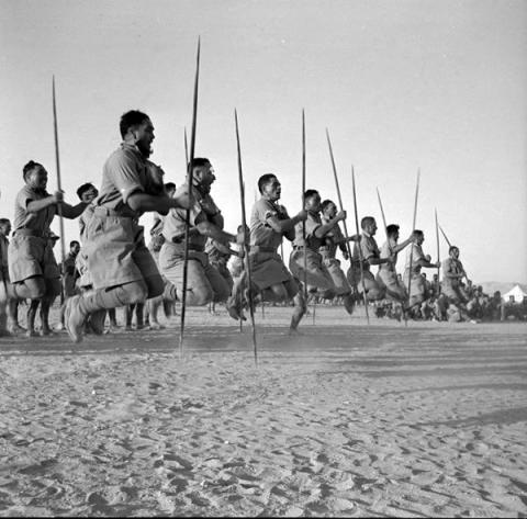 Maori Battalion performing a haka for the King of Greece